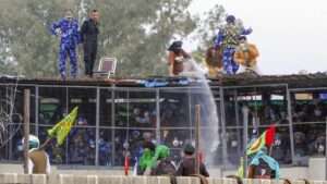 police respond with tear gas in Haryana.